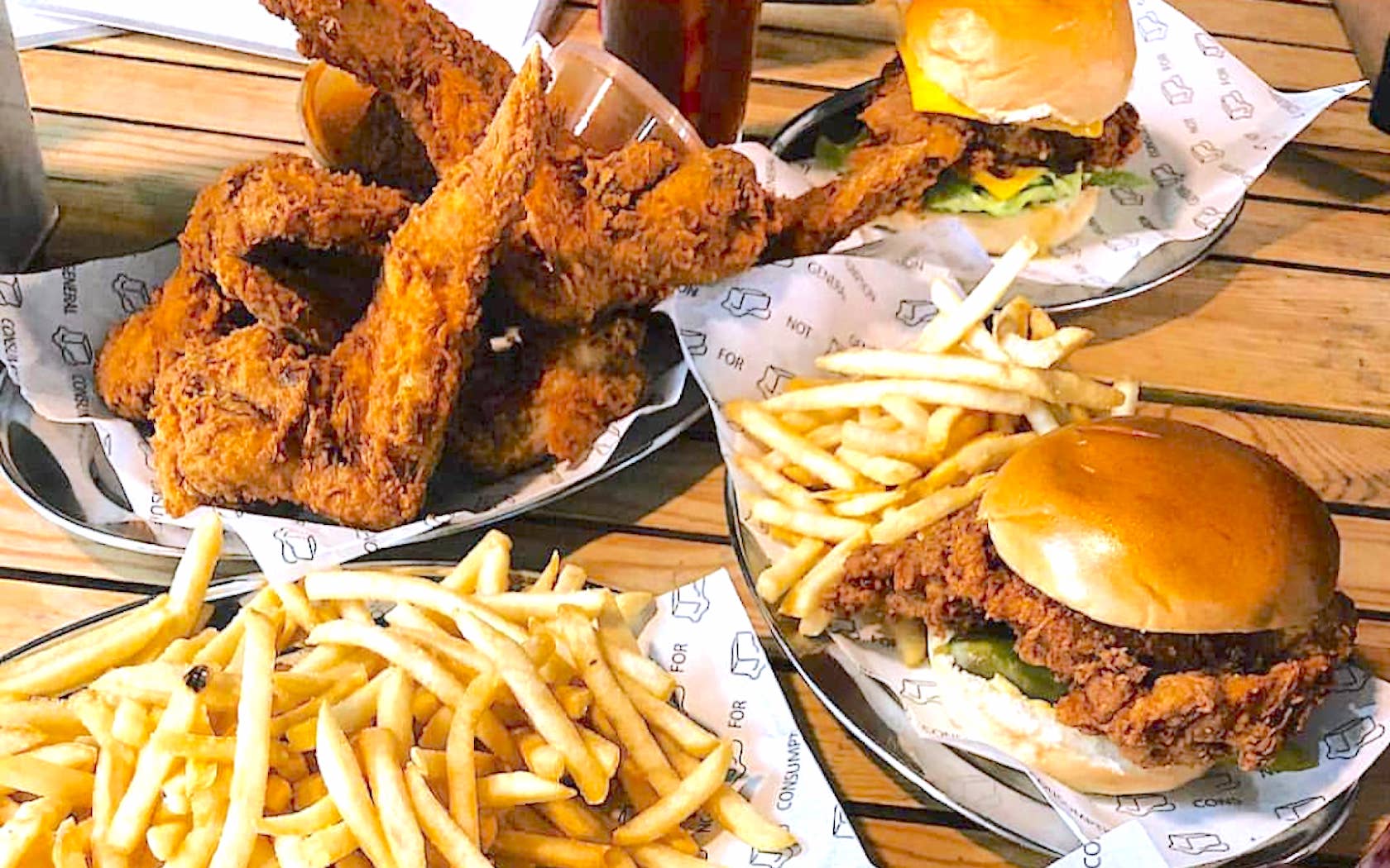 Butter's fried chicken sandwiches, wings and chips at Butter Sydney stores.
