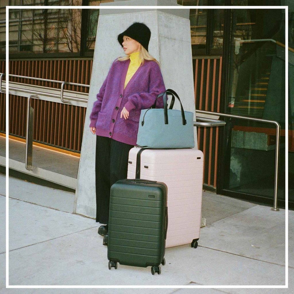 DANI ROCHE WITH SUITCASES