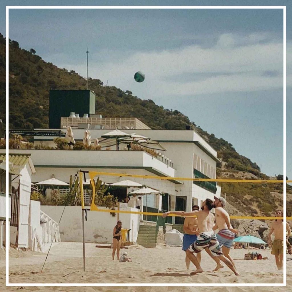 People playing beach volleyball at Soho House Barcelona